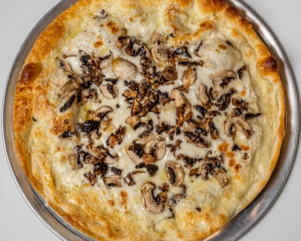 Wild mushroom truffle pizza with confit garlic and grana Padano at Binge Pizza, Calgary
